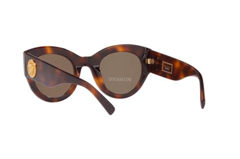 marcuzzi con occhiali versace 4353